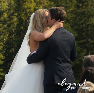 Bride groom wedding ceremony first kiss wedding dress in the mountains