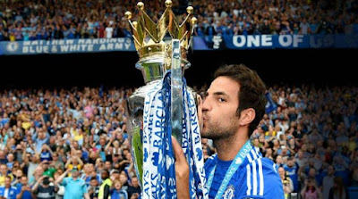 Cesc Fabregas celebrates winning the Premier League title