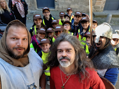 Jean-Francois Vassal teaching a class of school children about medieval times in Carcassone