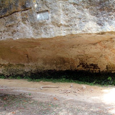 The Cro-Magnon rock shelter with reproduced skeletons.