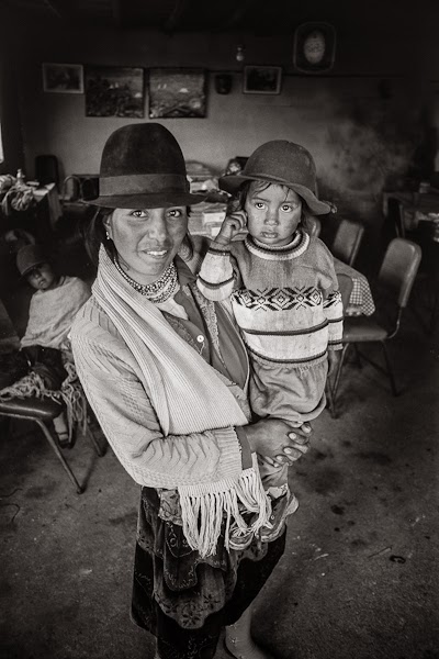 travel photograph, south america photo, latin america photo, andes culture, black and white photo, documentary photo, travel portrait, mother and child in the andes, ecuador, indigenous peoples, quilatoa ecuador