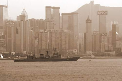 Image of a warship anchored in Hong Kong