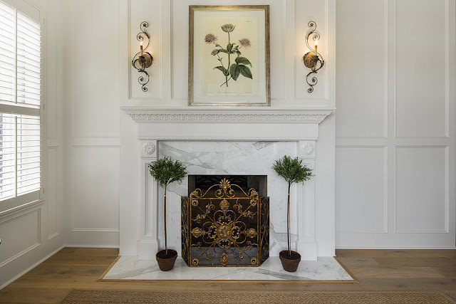 decor fireplace and sconces