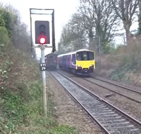 If this Class 150 Sprinter had been 30 seconds faster it would've ruined the view for the trainspotters on the other platform!