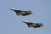 How Does The PAK FA Compare to Other 5th Generation Designs? (two russian pak fa stealth fighters flying together)