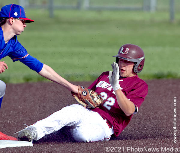 Damian Knoll slides into second on steal