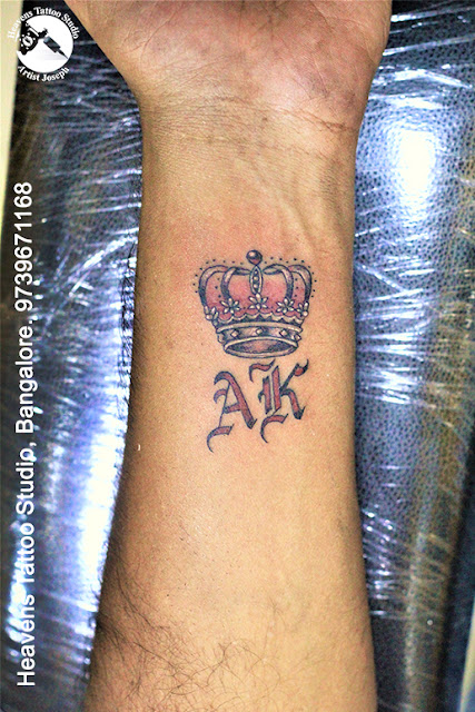 http://heavenstattoobangalore.in/crown-with-letter-tattoo-at-heavens-tattoo-studio-bangalore/