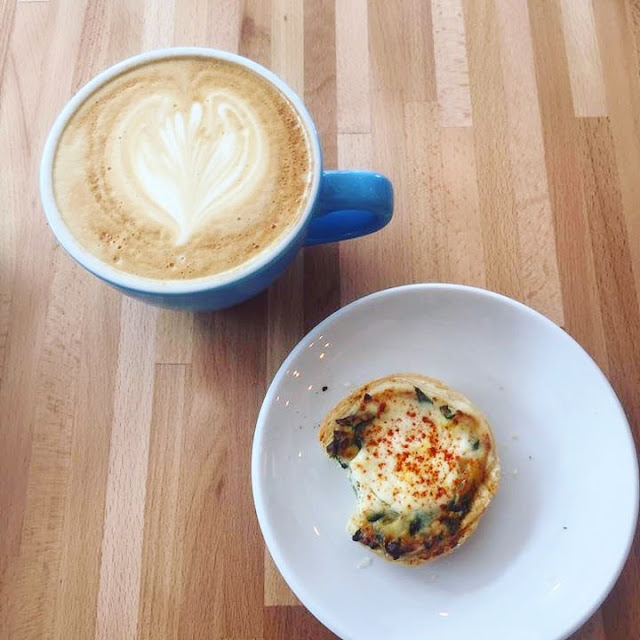 A honey latte and mini spinach quiche at Magpie Cafe Downtown