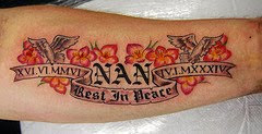 flowers on foot tattoo