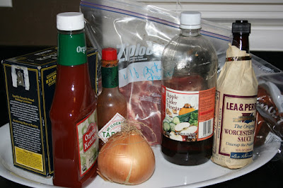 these are the ingredients to make a homemade from scratch barbecued pulled pork in the crockpot slow cooker. Recipe from ayearofslowcooking.com