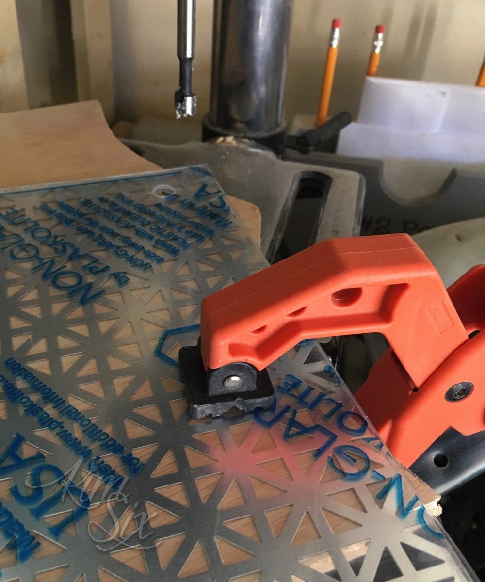 Drilling through sheet metal and plexiglass for floating frame