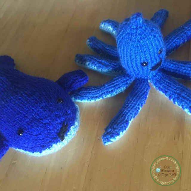 Picture of knitted whale and octopus soft toys