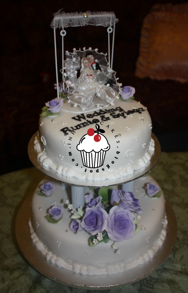 purple fondant 2tier wedding cake