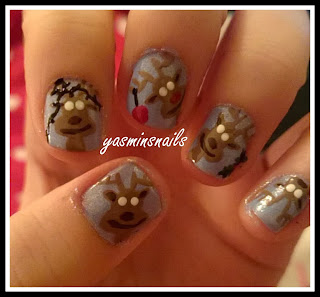 stage 3 of christmas drunk reindeer nail art by yasminsnails featuring holly, snow, baubles, fairy lights, bow ties  