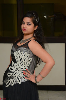 Shrisha Dasari in Sleeveless Short Black Dress At Follow Follow U Audio Launch 049.JPG