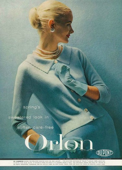 Model wearing a robin's egg blue sweater set in February Vogue 1956 Dupont Orlon Ad