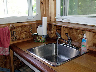 The sink in the potting shed is great for washing muddy hands and veggies so that the dirt doesn’t make it into the house.