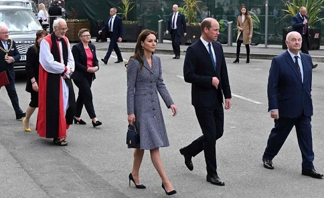 Kate Middleton wore a coat dress by Michael Kors. Vania Leles iconic Nile hoop earrings. Astley Clarke Stilla lapis pendant