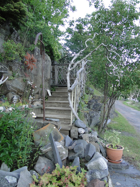 A garden with wooden steps