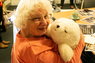 Jean and Paro, the Robotic Seal, meet each other