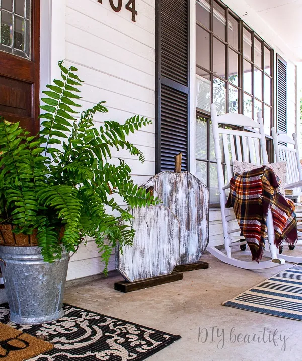 large scale porch pumpkins made from 2x4s