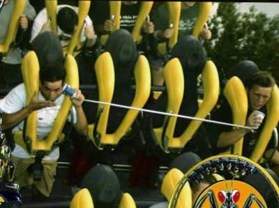 Funny People in Roller Coaster - Photos