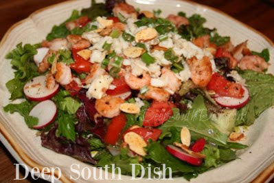 A mix of lettuces with vegetables, shrimp and crab and tossed with a Creole Vinaigrette for a light main dish salad.