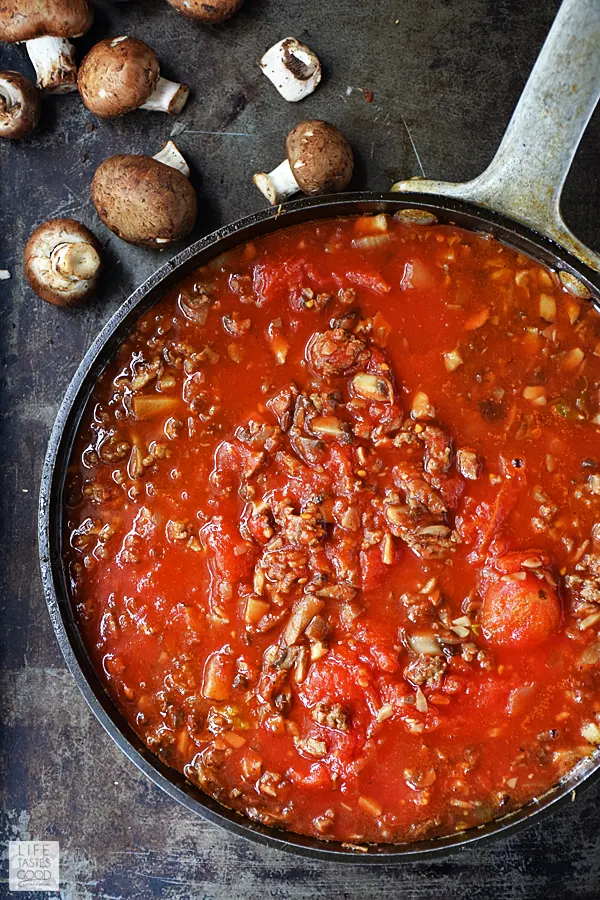 Mushroom Bolognese Pasta Recipe | by Life Tastes Good has a rich, thick, satisfying sauce atop hearty tagliatelle noodles. This recipe is a family style Italian meal that is a fairly easy recipe and fills your home with an irresistible aroma that will bring everyone to the dinner table! #LTGrecipes #SundaySupper