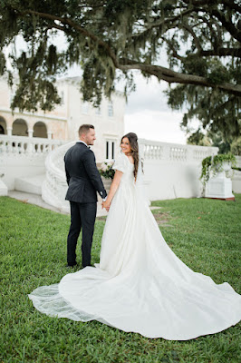 bride and groom taking photos