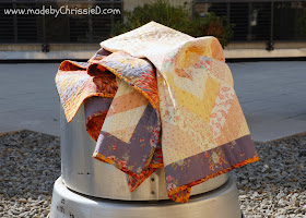 Autumn's Golden Gown - A Jelly Roll Quilt Tute by www.madebyChrissieD.com