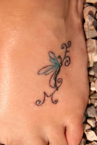 Dragonfly tattoo on foot