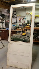 old screen door makes a great potting bench