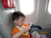 Inside airplane let him to paly the game , if not really can't stand 7.5 . (img )