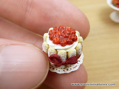 Miniature Cherry Charlotte held in hand