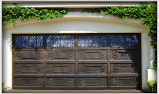 http://www.signatureirondoors.net/Garage-Doors.html