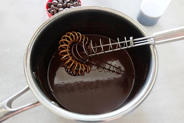 cooked hot fudge ingredients in saucepan