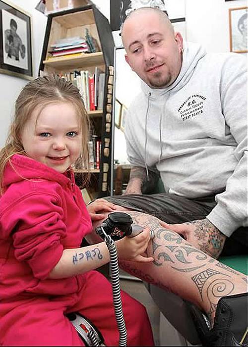  about playground swings, Ruby takes tattoo lessons after nursery school.