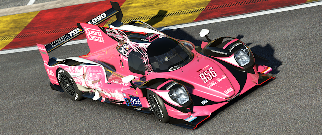 Picture from rFactor 2: an Oreca 07 LMP2 in the Queens' Design colours. It is pink with matte black and glossy white accents. On the sides is victoire Laviolette, the team's mascot.