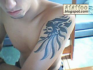 Ricardo Lima - Leão tribal tatuado no braço