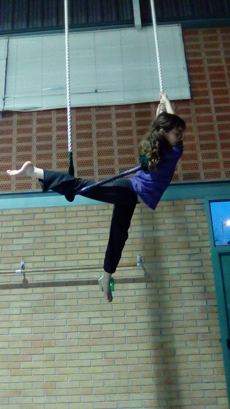 Haciendo trapecio.