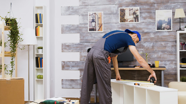 eTasker handyman assembling flat-pack and modular furniture, ensuring correct and secure setup.