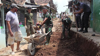 Kodim 0410/KBL Lakukan Pengecoran Jalan Pada TMMD ke 109