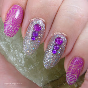 Purple zebra print negative space stamping nail art over holographic glitter base.