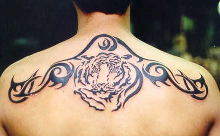 Tribal tattoos for men can be craved on back arm shoulder blades and neck