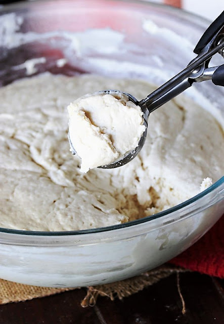 Scooping Overnight Spoon Rolls Dough Image