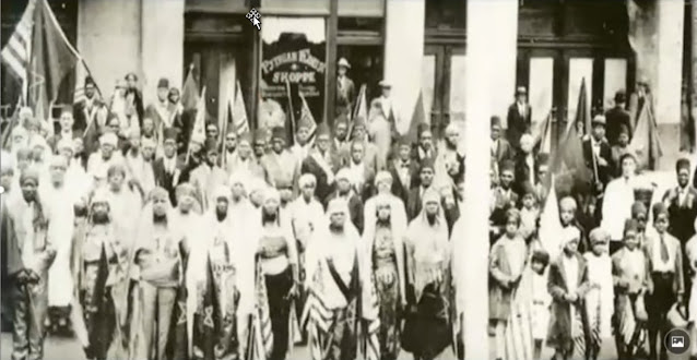 full image of 1929 msta convention with moors and flags in the background visible