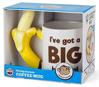 Big Banana Coffee Mug With Winking Monkey Graphic At The Bottom Of The Mug