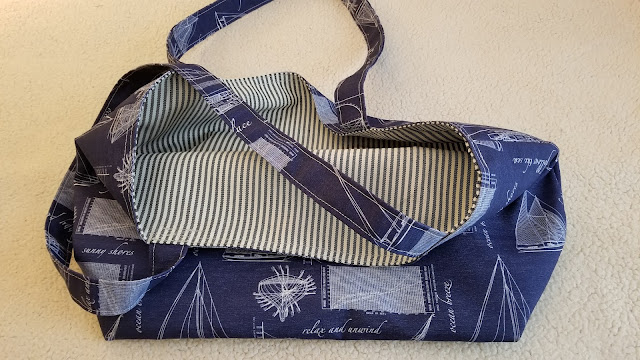 Blue grocery bag with liner.