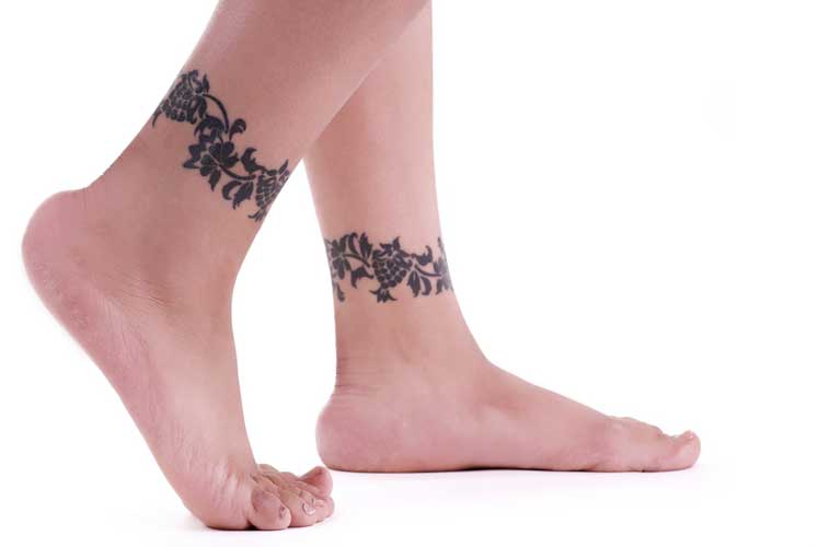 rosary ankle tattoos. bow tattoo on ankle. rosary