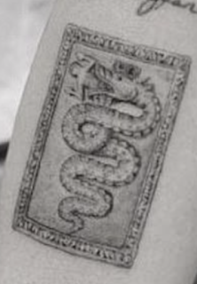 Miley Cyrus's man-eating snake tattoo